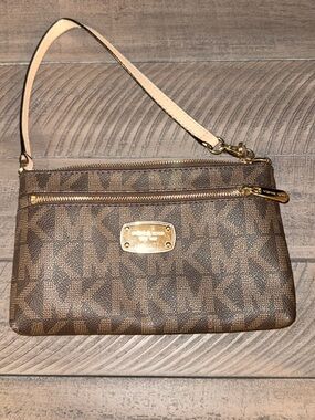 Michael Kors Brown Signature Zip Wristlet with Gold Plate
